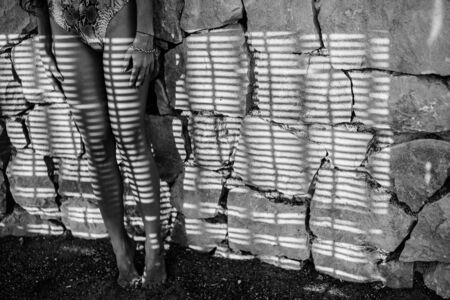 long legs shadow   fashion shot in black and whiteの写真素材