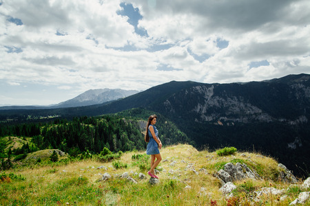 woman relax in fascinating landscape of mountains in Montenegroの写真素材
