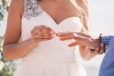 wearing wedding ring ceremony traditionの写真素材