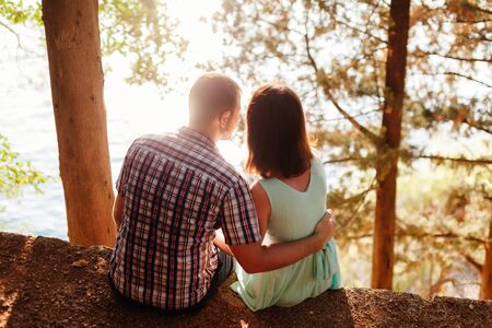 lovely couple travel together in park with sunlightの写真素材