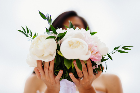 wedding bouquet orchids and peonies. Fine art wedding bouquet and flowers backgroundの写真素材