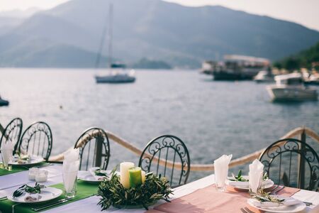 table coverage decoration with olive flowers. Wedding venueの写真素材