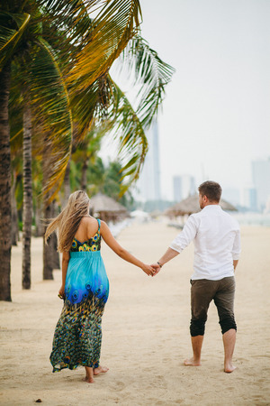 couple travel beach resort together. Sea view and sandy beach in Asia, Vietnamの写真素材