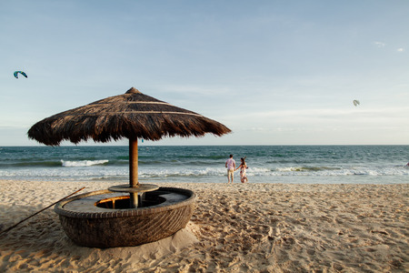 happy couple run on beach. Sea view and sandy beach in Asia, Vietnamの写真素材