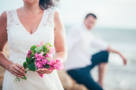 honeymoon couple relax on beach. Sea view and sandy beach in Asia, Vietnamの写真素材