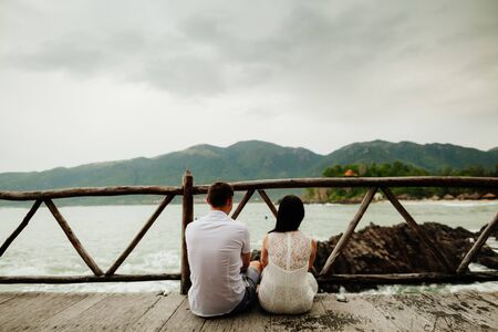 honeymoon couple relax on beach. Sea view and sandy beach in Asia, Vietnamの写真素材