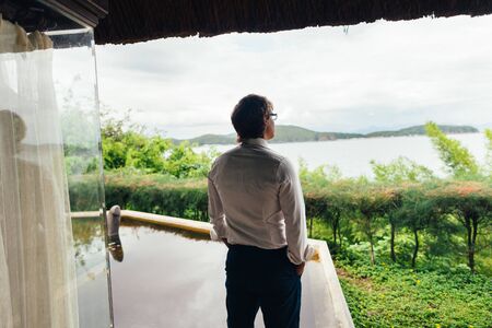 man on beach resort in tropics. Honeymoonの写真素材