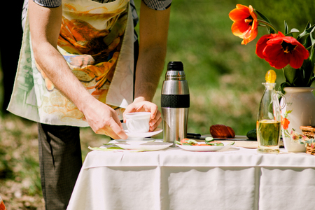 healthy eating picnic with vegetables outdoors. Vegetarian picnic in forest.の写真素材