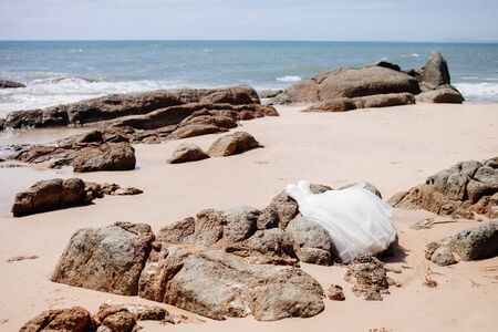 wedding dress on beach with sea view. Honeymoon with sea view and beach in tropicsの写真素材