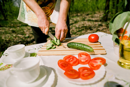 healthy eating picnic with vegetables outdoors. Vegetarian picnic in forest.の写真素材