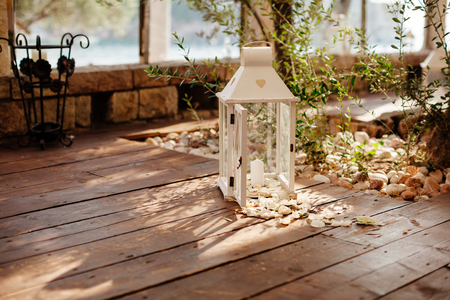 wedding table flower decoration with candles backgroundの写真素材