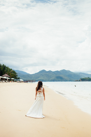 bride travel beach resort. Honeymoon with sea view and beach in tropicsの写真素材