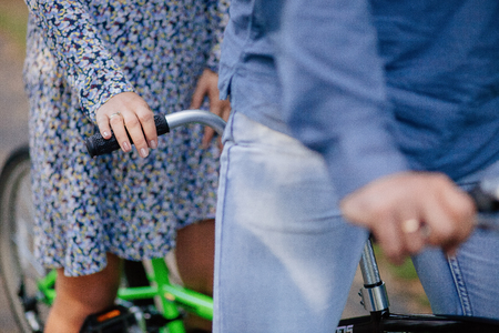 couple with tandem bicycle. lovely couple tandem bicycle riding.の写真素材