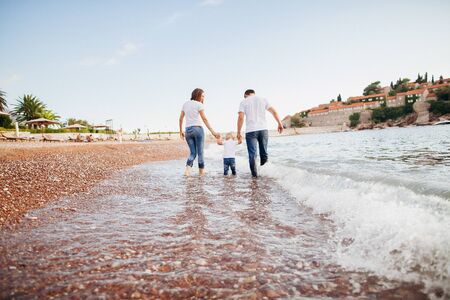 family relax on beach. Family travel sea side.の写真素材