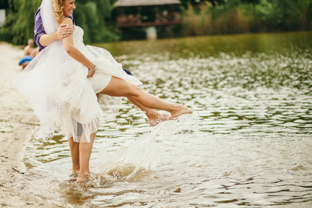 Barefoot Wedding Couple. Happy married couple.の写真素材