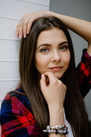 long hair woman with mole on face. Portrait unfiltered. Caucasian woman.の写真素材