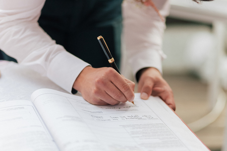Groom Signing Marriage License Or Wedding Contractの写真素材