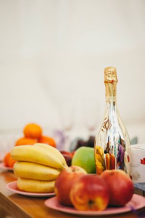Still Life With Champagne Bottle And Fruitsの写真素材