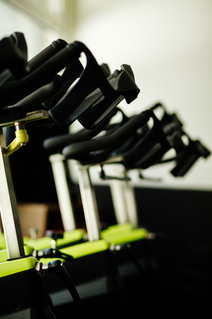 Indoor Cycling bicycle. Set of cycling bikesの写真素材