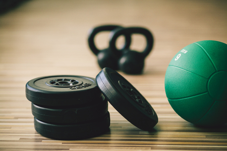 weights and medicine ball fitness background. Fitness and sport accessoriesの写真素材