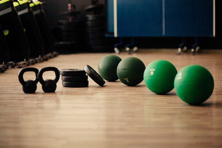 weights and medicine ball fitness background. Fitness and sport accessoriesの写真素材