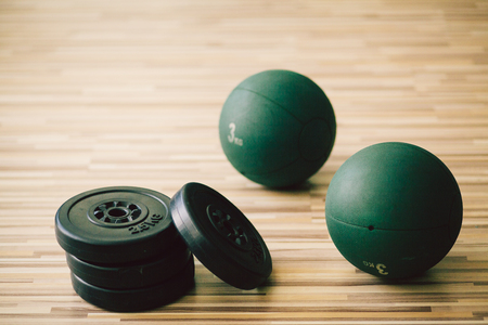 weights and medicine ball fitness background. Fitness and sport accessoriesの写真素材