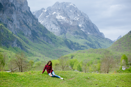 woman travel mountains in casual clothes. Female relax in mountains. Montenegro.の写真素材