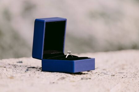 engagement ring in box. Blue box with an engagement ring for proposalの写真素材