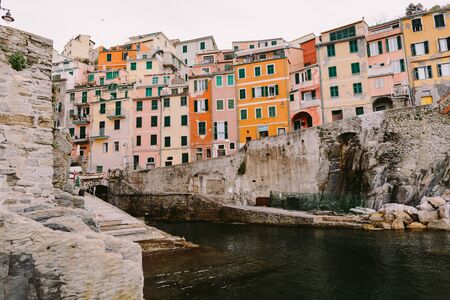 Riomaggiore view in Cinque Terre. Travelling in Cinque Terre, Italy. Beautiful old town view in...