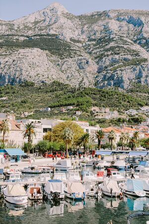makarska riviera croatia background. Dalmatia region. Mountains and old town with sea view harbour...