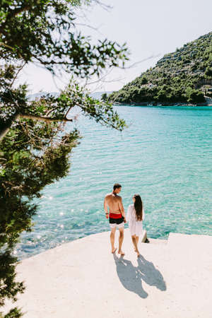 happy young couple relax on beachの写真素材