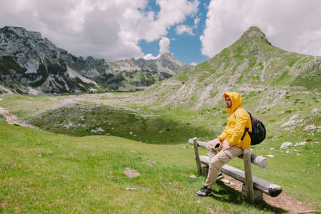 man travel mountains on holidays