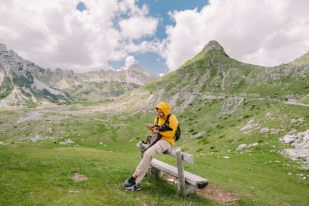 man travel with dog in mountainsの写真素材