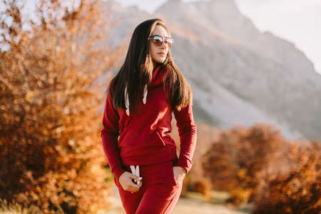 woman relax in autumn forestの写真素材