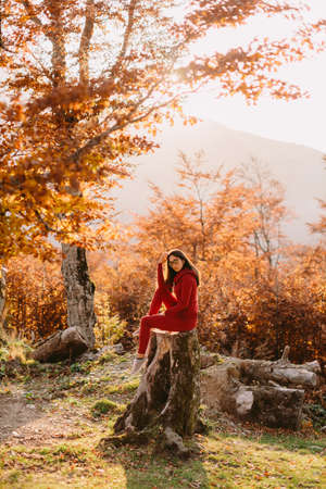 woman relax in autumn forestの写真素材