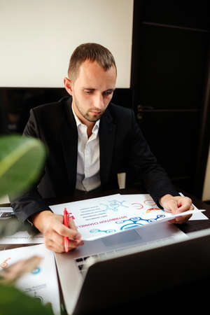 marketing product manager holding marketing promotion planの写真素材