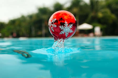 new year tree decoration splashes from the bleu waterの写真素材