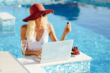 freelancer woman using laptop and work remotelyの写真素材