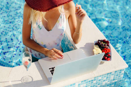 freelancer woman using laptop and work remotelyの写真素材