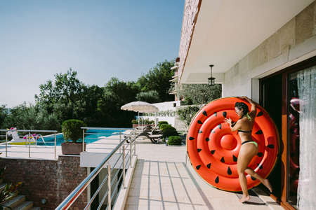 Pool Float woman on summer vacationsの写真素材