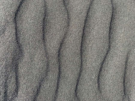abstract black sand background. dark sand wavesの写真素材