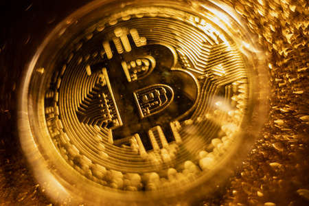 Bitcoin icon sign payment symbol golden backgroundの写真素材
