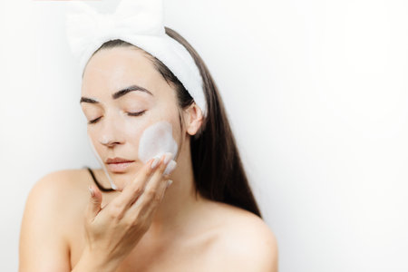 Facial Cleanser woman face close upの写真素材