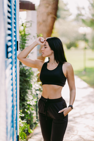 attractive fitness Female in sportswear outdoors. slim athletic Female posingの写真素材
