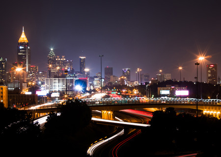 The best Atlanta Downtown overlook at night with traffic flow and blue skyの写真素材