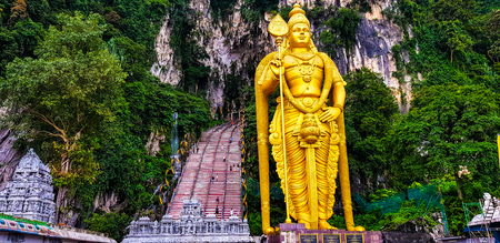 lord murugan statue and front view of batu caves, malaysia,2017のeditorial素材