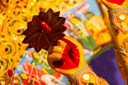 chakra on the finger of godess durga. hindu mythology idol worship