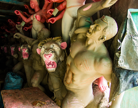 Kumartuli,West Bengal, India, July 2018. A clay idol of Lion and demon mahishashura, the associates of Goddess Durga under construction.Durga puja is the most awaited hindu festival worldwide.のeditorial素材