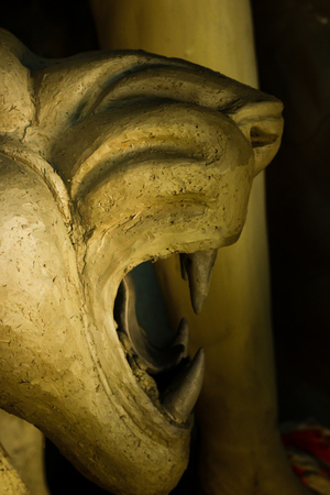 Kumartuli,West Bengal, India, July 2018. A clay idol of Lion,showing large sharp canine teeth. Lion is the ride of Goddess Durga and Durga puja is the most awaited hindu festival worldwide.のeditorial素材