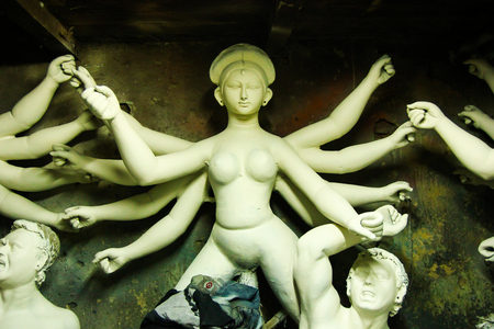 Kumartuli,West Bengal, India, July 2018. A clay idol of Goddess Durga under construction at a shop. Durga puja is the most awaited hindu festival in eastern India and worldwide.のeditorial素材